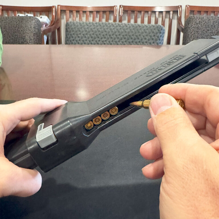 Loading an AR-15 round into the RAM-IT